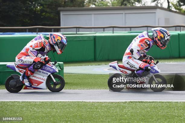 Prima Pramac Racing MotoGP riders, Jorge Martin of Spain chases Johann Zarco of France during MiniBike race, the pre-event for October 1, 2023 MotoGP...