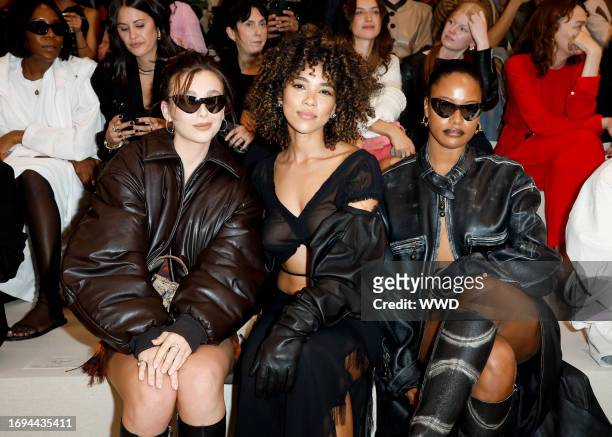 Emma Chamberlain, Alexandra Shipp and Taylour Paige at Acne Studios Ready To Wear Spring 2024 held at Observatoire de Paris on September 27, 2023 in...