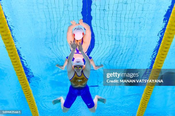 China's Ye Shiwen competes in the heats of women's 200m breaststroke event during the Hangzhou 2022 Asian Games in Hangzhou in China's eastern...