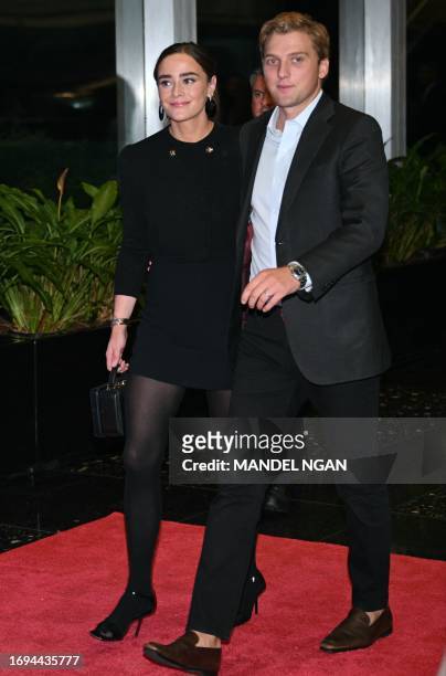 Naomi Biden, the granddaughter of US President Joe Biden, and her husband Peter Neal arrive for a reception and live performances celebrating the...