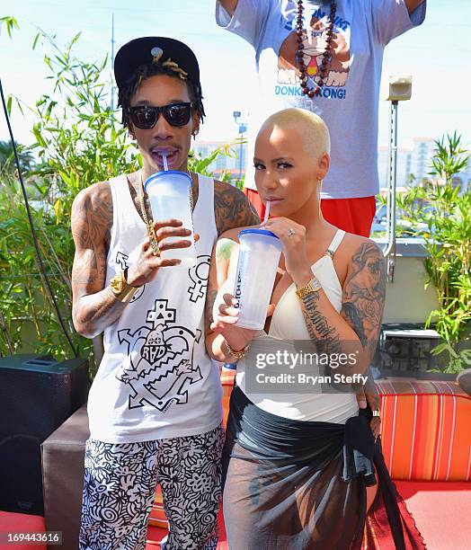 Rapper Wiz Khalifa and model Amber Rose attend Ditch Fridays at the Palms Pool & Bungalows at the Palms Casino Resort on May 24, 2013 in Las Vegas,...