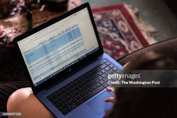 Jennifer Petersen shows the spreadsheet that she uses to track her book challenges, at her home on Tuesday, August 22, 2023. Petersen has filed...