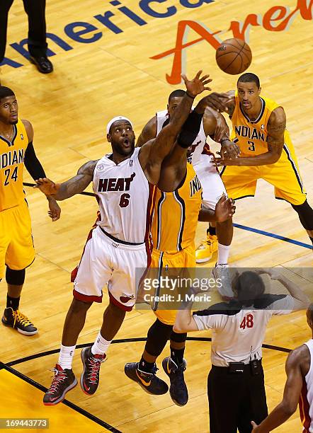 LeBron James of the Miami Heat and Roy Hibbert of the Indiana Pacers go up for a jump ball in the second half during Game Two of the Eastern...