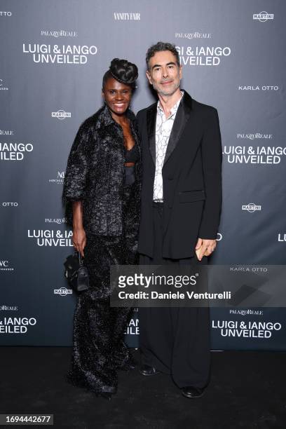Charity Dago and a guest attend the Luigi & Iango Unveiled Exhibition Opening at Palazzo Reale on September 21, 2023 in Milan, Italy.