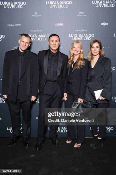 Iango Henzi, Luigi Murenu and guests attend the Luigi & Iango Unveiled Exhibition Opening at Palazzo Reale on September 21, 2023 in Milan, Italy.