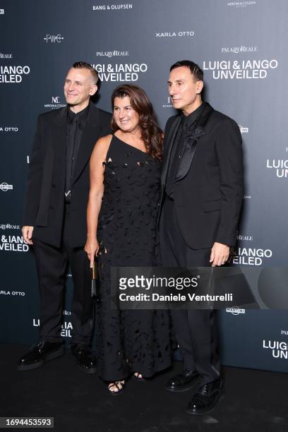 Iango Henzi, a guest and Luigi Murenu attend the Luigi & Iango Unveiled Exhibition Opening at Palazzo Reale on September 21, 2023 in Milan, Italy.