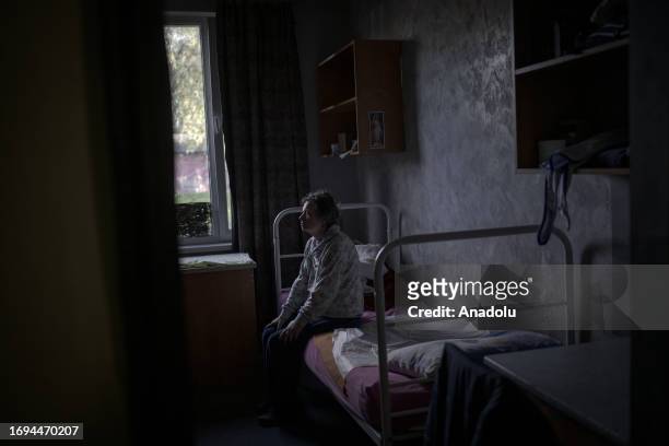 Tatyana, an Alzheimer patient, spends most of time sitting in her room at a nursing home, in which she was transferred by volunteers after she lost...