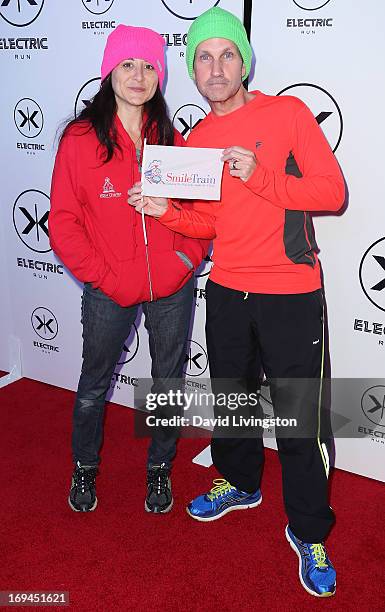 Comedian Jimmy Pardo and wife Danielle Koenig attend Electric Run LA at The Home Depot Center on May 24, 2013 in Carson, California.