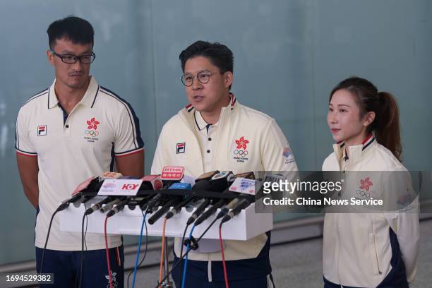 Rugby player Salom Yiu Kam Shing, head of the Hong Kong delegation Kenneth Fok Kai-kong and Wushu athlete Juanita Mok Uen-ying meet media at Hong...