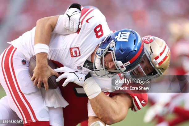 Nick Bosa of the San Francisco 49ers sacks Daniel Jones of the New York Giants during the first quarter in the game at Levi's Stadium on September...