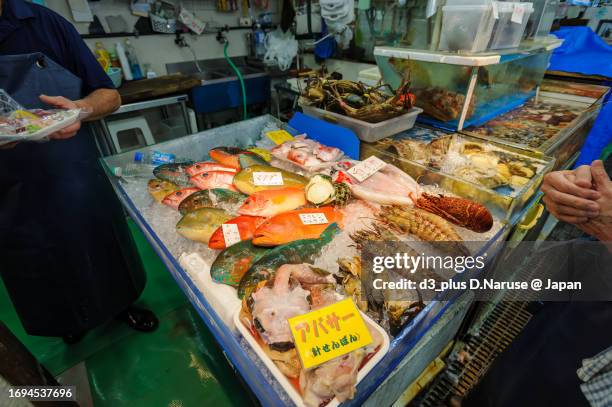 fresh seafood at the interesting tropical market, makishi public market.

ama beach, zamami island, zamami vil., shimajiri, okinawa, japan.
photo taken november 25, 2022. - 那覇市 個照片及圖片檔