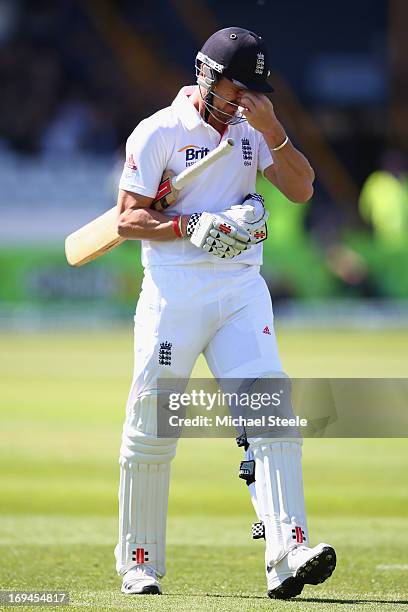 Nick Compton of England walks off dejectedly after being caught by Dean Brownlie off the bowling of Tim Southee of New Zealand during day two of the...