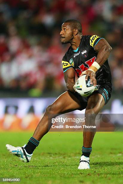 James Segeyaro of the Panthers passes the ball during the round 11 NRL match between the St George Ilawarra Dragons and the Penrith Panthers at WIN...