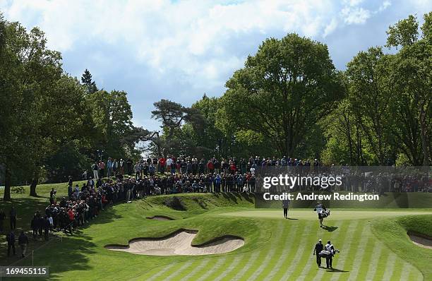 David Drysdale of Scotland and Graeme Storm of England walk on to the second green during the third round of the BMW PGA Championship on the West...