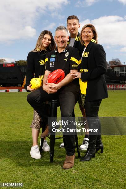 Adem Yze poses for a photo with his children Jasmine and Noah and wife Afijet after being announced as Richmond coach during a Richmond Tigers AFL...