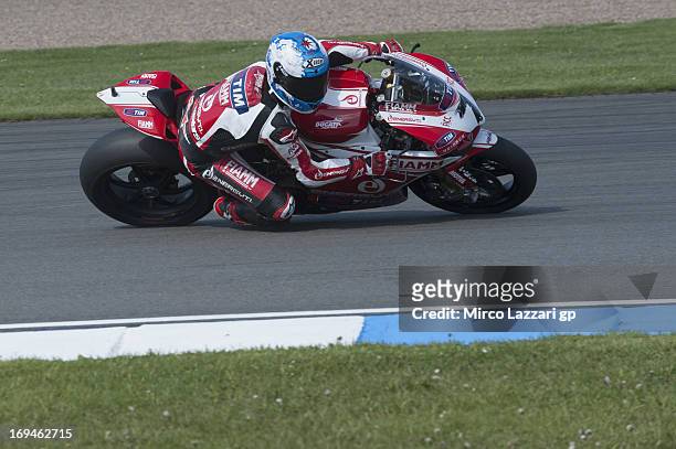 Carlos Checa of Spain and Team Ducati Alstare rounds the bend during the World Superbikes - Qualifying during the round five of 2013 Superbikes FIM...