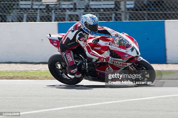 Carlos Checa of Spain and Team Ducati Alstare rounds the bend during the World Superbikes - Qualifying during the round five of 2013 Superbikes FIM...