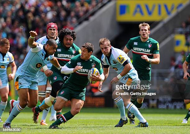 Anthony Allen of Leicester is pursued by Luther Burrell of Northampton during the Aviva Premiership Final between Leicester Tigers and Northampton...