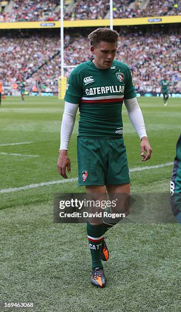 Toby Flood of Leicester walks off the pitch after being injured by a tackle from Courtney Lawes during the Aviva Premiership Final between Leicester...