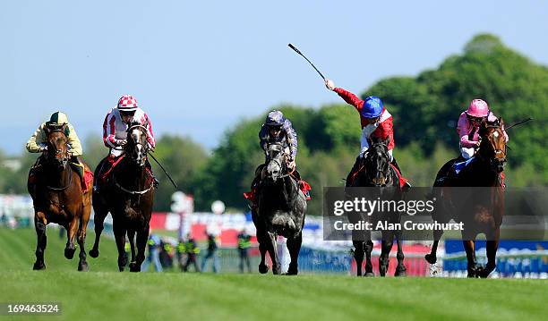 Shane Kelly riding Kingsgate Native win The Betfred Temple Stakes at Haydock racecourse on May 25, 2013 in Haydock, England.