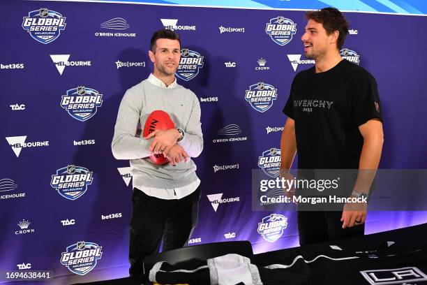 Retired Richmond AFL player Trent Cotchin meets Kevin Fiala of the LA Kings trains during an NHL Global Series Practice Session at Rod Laver Arena on...