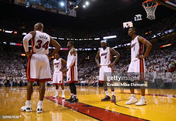 Ray Allen, Mario Chalmers, Dwyane Wade, LeBron James and Chris Bosh of the Miami Heat look on late in the game against the Indiana Pacers during Game...