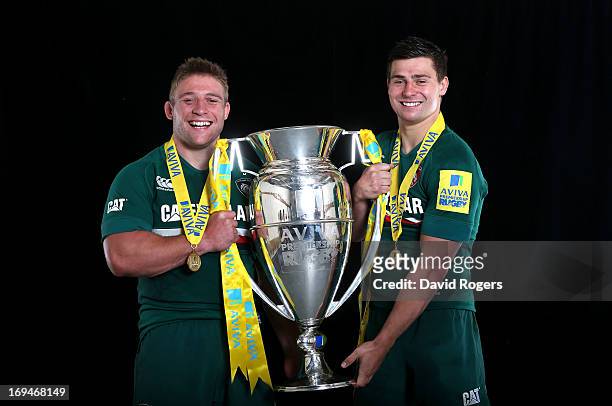 Brothers Tom Youngs and Ben Youngs of Leicester poses with trophy following his team's 37-17 during the Aviva Premiership Final between Leicester...