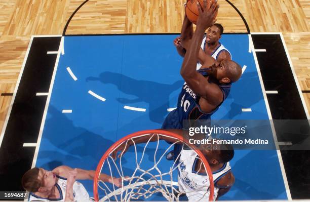Brendan Haywood of the Washington Wizards grabs the rebound during the NBA game against the Orlando Magic at TD Waterhouse Centre on December 6, 2002...