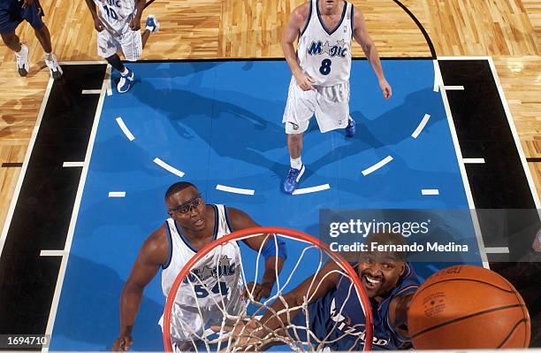 Bryon Russell of the Washington Wizards shoots a layup during the NBA game against the Orlando Magic at TD Waterhouse Centre on December 6, 2002 in...