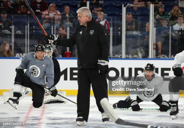 Head coach Todd McLellan of the Los Angeles Kings talks to his players at center ice during practice before the NHL Global Series Melbourne games...