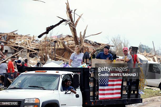 Group of volunteers make their way to help tornado victims in Moore, Oklahoma, on May 25, 2013. The tornado, one of the most powerful in recent...