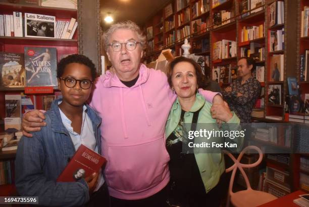 Dominique Besneard poses with young Nathanael Deschryver and Marie-Rose Guarnieri from Le Prix Wepler and director of La Librairie des Abbesses...