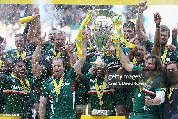 Geordan Murphy and Martin Castrogiovanni of Leicester Tigers raise the trophy during the Aviva Premiership Final between Leicester Tigers and...