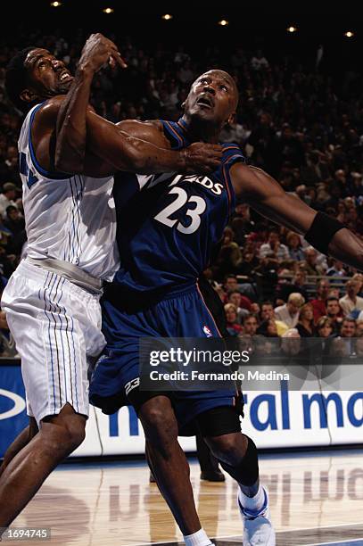 Michael Jordan of the Washington Wizards battles for position against Ryan Humphrey of the Orlando Magic during the NBA game at TD Waterhouse Centre...