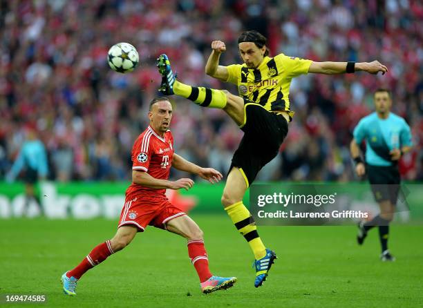 Franck Ribery of Bayern Muenchen in action with Neven Subotic of Borussia Dortmund during the UEFA Champions League final match between Borussia...