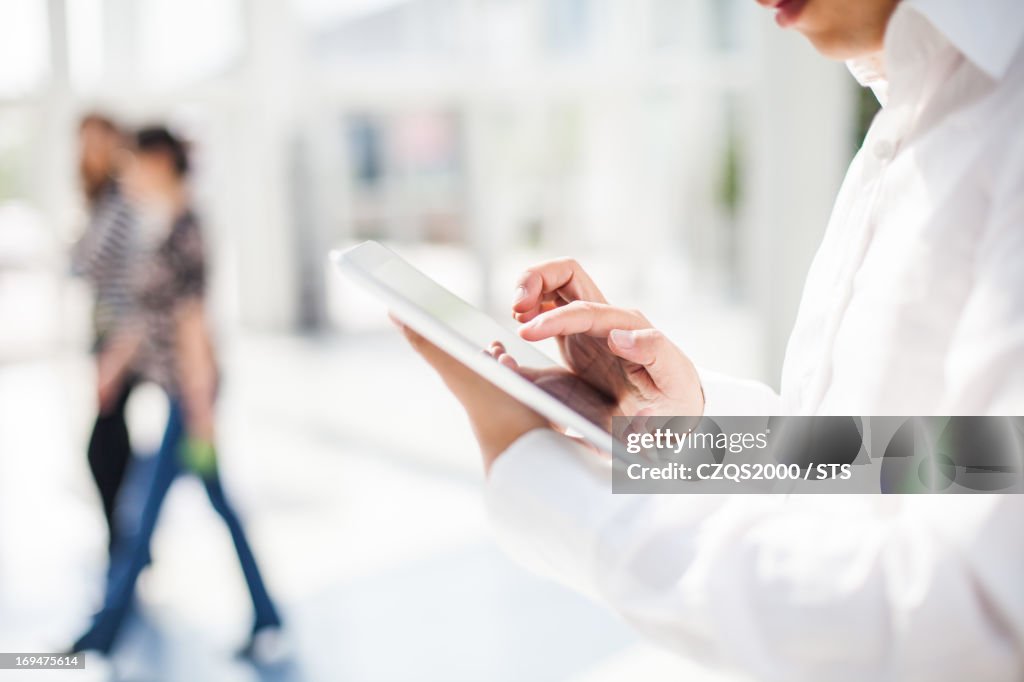 Businessman using digital tablet