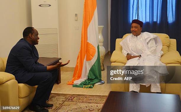 President of Niger Mahamadou Issoufou meets with Tiebile Drame, special adviser to the Malian president for northern Mali, at the presidential...