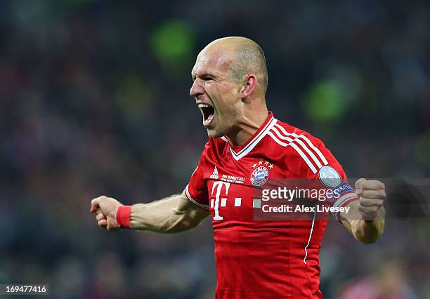 Arjen Robben of Bayern Muenchen celebrates after winning the UEFA Champions League Final against Borussia Dortmund at Wembley Stadium on May 25, 2013...