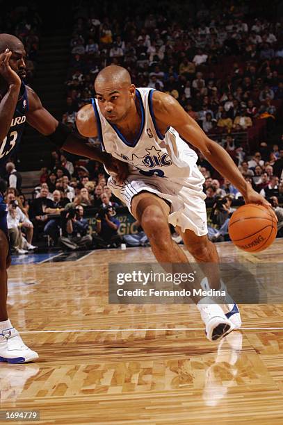 Grant Hill of the Orlando Magic drives to the basket during the NBA game against the Washington Wizards at TD Waterhouse Centre on December 6, 2002...