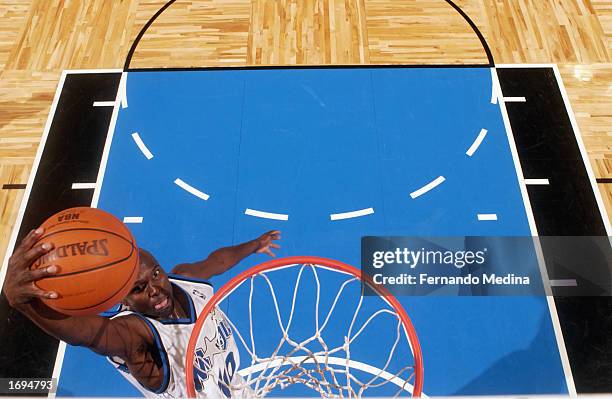 Darrell Armstrong of the Orlando Magic goes up for the dunk during the NBA game against the Washington Wizards at TD Waterhouse Centre on December 6,...