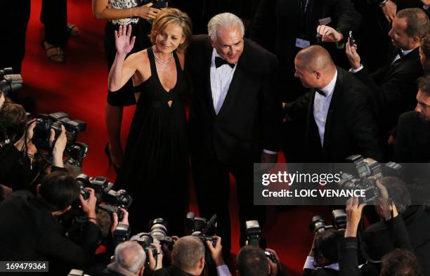 Ex-IMF chief Dominique Strauss-Kahn and Media Marketing Executive Myriam L'Aouffir pose on May 25, 2013 as they arrive for the screening of the film...