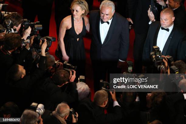 Ex-IMF chief Dominique Strauss-Kahn and Media Marketing Executive Myriam L'Aouffir pose on May 25, 2013 as they arrive for the screening of the film...