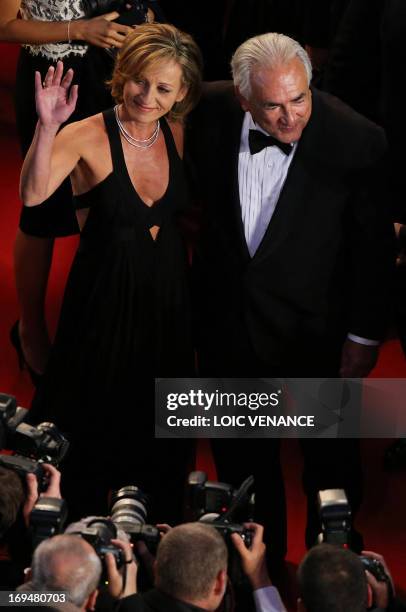 Ex-IMF chief Dominique Strauss-Kahn and Media Marketing Executive Myriam L'Aouffir pose on May 25, 2013 as they arrive for the screening of the film...