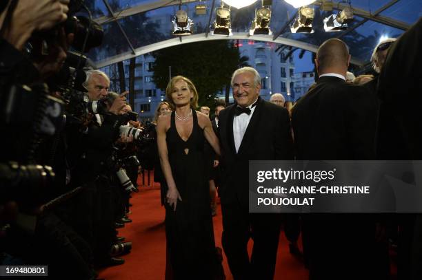 Ex-IMF chief Dominique Strauss-Kahn and Media Marketing Executive Myriam L'Aouffir arrive on May 25, 2013 for the screening of the film "Only Lovers...