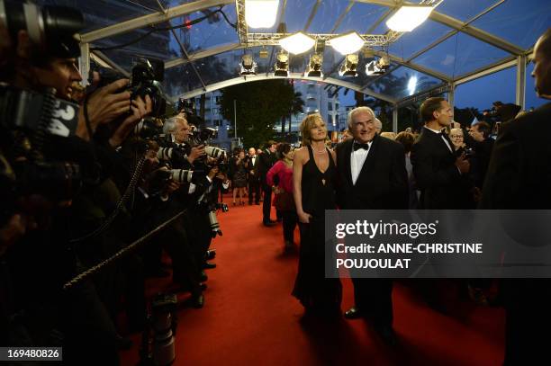 Ex-IMF chief Dominique Strauss-Kahn and Media Marketing Executive Myriam L'Aouffir arrive on May 25, 2013 for the screening of the film "Only Lovers...
