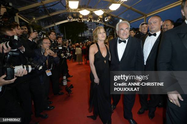 Ex-IMF chief Dominique Strauss-Kahn and Media Marketing Executive Myriam L'Aouffir arrive on May 25, 2013 for the screening of the film "Only Lovers...
