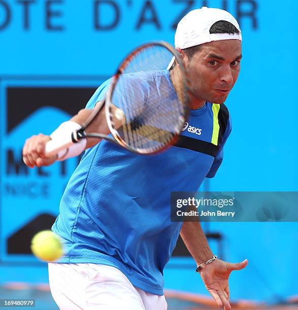 Albert Montanes of Spain in action against Gael Monfils of France in their final match during day seven of the Open de Nice Cote d'Azur 2013 at the...