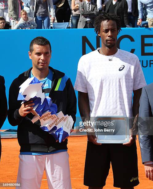 Albert Montanes of Spain holding the trophy and Gael Monfils of France after their final match during day seven of the Open de Nice Cote d'Azur 2013...