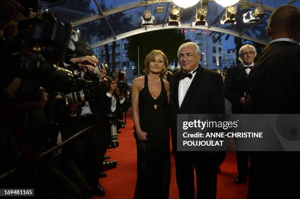 Ex-IMF chief Dominique Strauss-Kahn and Media Marketing Executive Myriam L'Aouffir arrive on May 25, 2013 for the screening of the film "Only Lovers...