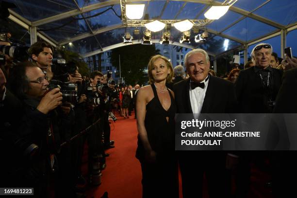 Ex-IMF chief Dominique Strauss-Kahn and Media Marketing Executive Myriam L'Aouffir arrive on May 25, 2013 for the screening of the film "Only Lovers...